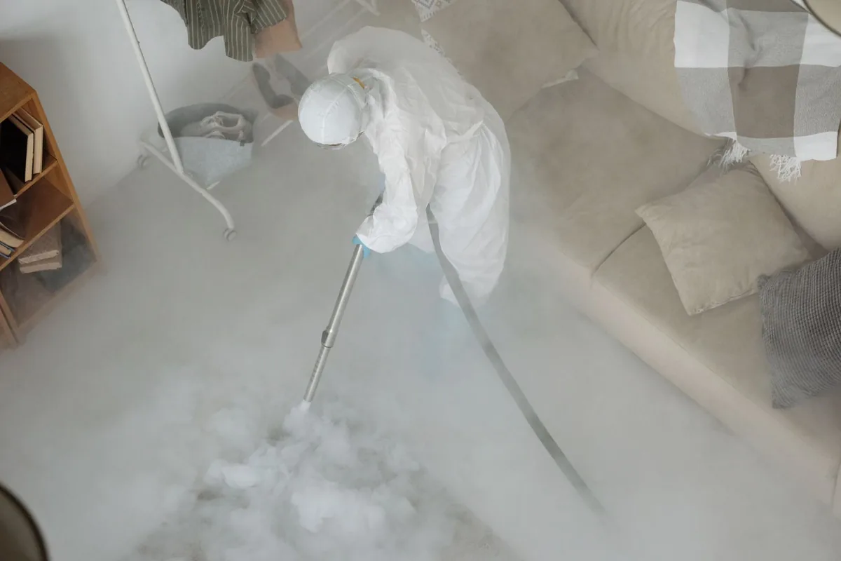 Biohazard cleanup technician in protective equipment, Verona, NY